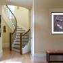 "Admirer, 1947 Easter Bonnet" shown matted and framed in a room setting.