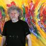The Artist Peter Nottrott and the artwork 'Yellow Energy Waves XXL 1'.