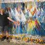 The artist Peter Nottrott and the artwork 'Stormy Sailing Regatta XXXL 2'.
