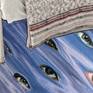 Detail under the bed of floating eyes.