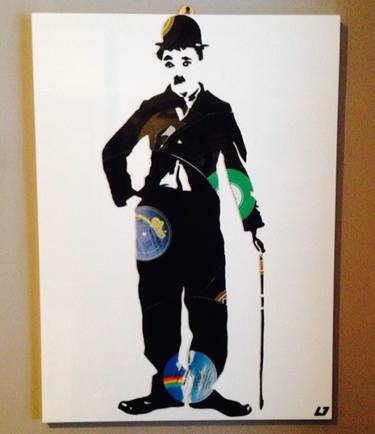 banksy style charlie  chaplin standing thumb