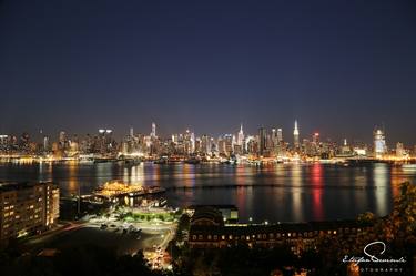 Panoramic Skyline of Manhattan at Night thumb