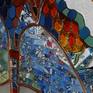 Gaudi is one of my favorite artists and architects.I wanted to pay homage to him so I used both, models and colors found in his extraordinary mosaics. 
I used small pieces of colored glass in floral mosaics, I painted glass on both sides to give him depth and then I assembled everything together. The multilayered arrangement gives volume and the sensation of flowing motion
The "Windows of Barcelona" shows my love for the colors and the fairy world of Gaudi in an abstract way.
