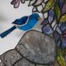 Blue Bird is a 3DTiffany stained glass. All the pieces are painted and soldered together to offer a sweet and transparent image of innocence and purity. The peaceful and sunny atmosphere suggested by the tempered colors bring us back in a vintage setting.