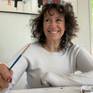 Contemporary latin american artis Alicia Savio in her art studio