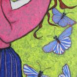 A GIRL PLAYING WITH BLUE BUTTERFLIES by Shivayogi Mogali