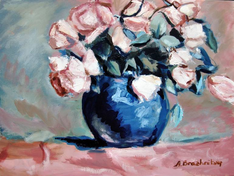 Light pink roses in a blue vase
