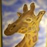 This picture depicts a giraffe against a cloudy sky background.