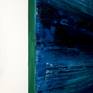 Narrow side view of the painting