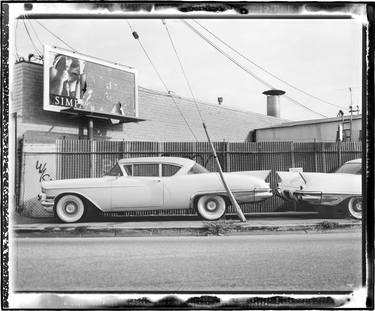 Two '57 Eldo Sevilles at Gene's Body Shop thumb