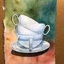This is part of a series of three watercolours depicting 4 stacked white cups.
My focus was on the background where I played with the watercolour pigments, granulations, effects and different colour combinations.

This one is smaller than the others and I used a handmade watercolour paper with deckled edges.