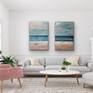 This diptych is a pastel morning delight. 

The white surf, the pink and gold sand, the gentle blue of the waves, with my unique type of impressionism. 

Set the panels as close or as far fro each other as you would like. 

A beautiful add to a living room, office space, or even bedroom.