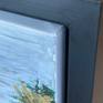 Canvas seated in a floater frame