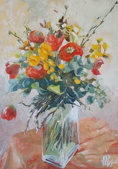Flowers in a tall glass vase thumb