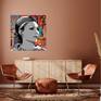 A Portrait of Farah Diba, former queen of Iran on a background of persian carpets and text. A Signed Artprint on canvas with handpainted golden details in the background. Limited edition 2/25. The original painting is 1.00 x 1.00 x 4 cm (10 copies will be made). Delivery time on request. For more information info@joleart.nl.
