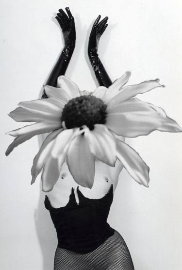 Flower head with fishnet stocking thumb