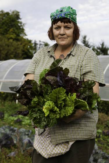Portrait of farmer with harvested chard thumb