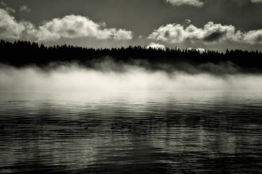 Morning fog rising over water thumb