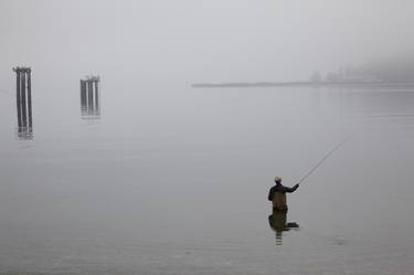 Fishing on a foggy morning thumb