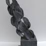 'Reunion' is an abstract steel sculpture with a galvanised etched finish.