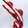 'Mid summer flourish' is an abstract sculpture from steel with a painted finish.