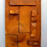 'Ovation' is an abstract wall sculpture from steel with a rust and matt laquered finish.
