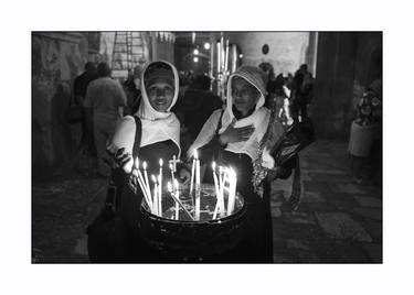 Lighting candles In The Ethiopian monastery. with a Limited Edition of 10 thumb