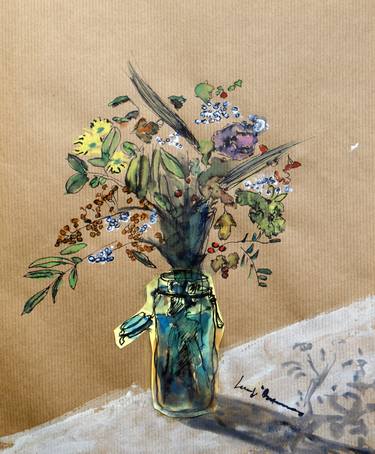 wild flowers in a glass vase thumb