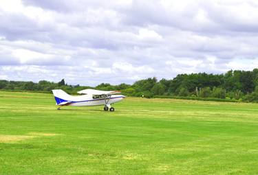 Glider in an open field thumb