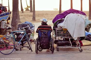 'California dreaming, man on wheels' thumb