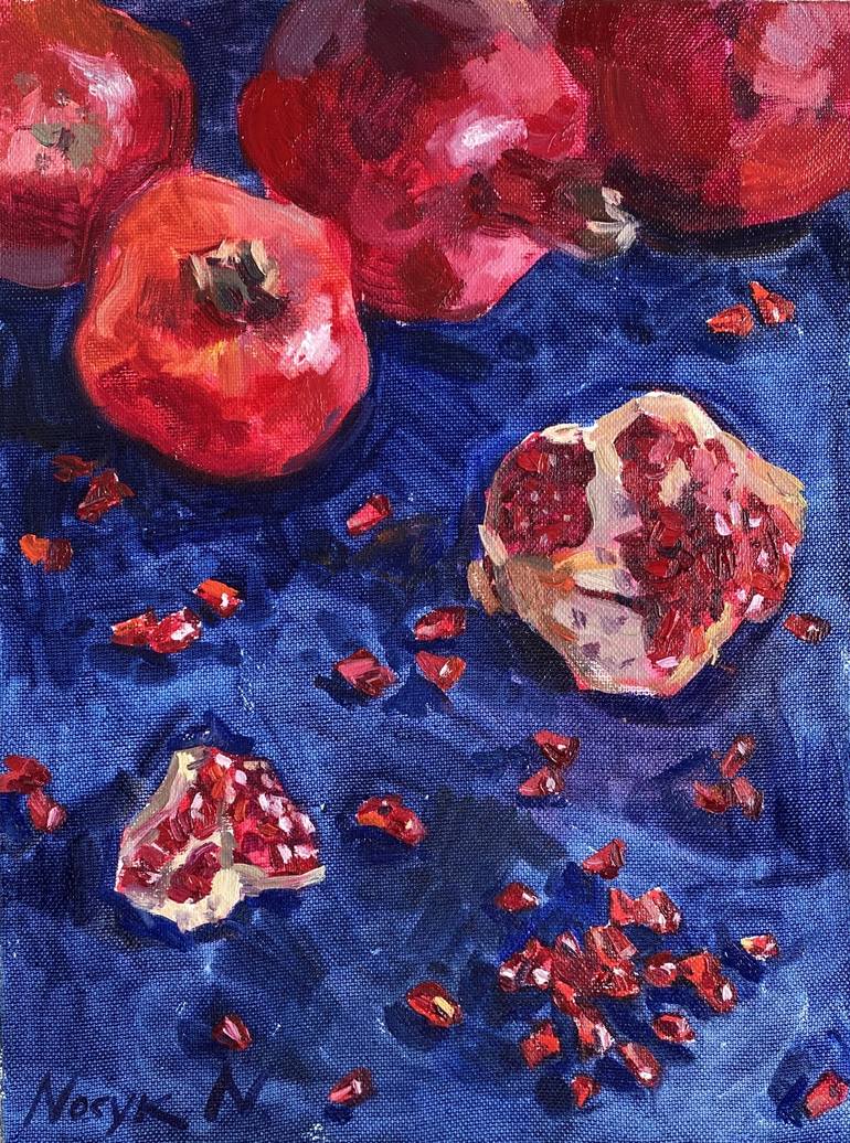 Pomegranates on blue