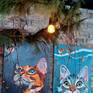 Cat and Robins at an exhibition in Krakow, Poland