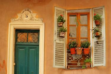 Door and window with flowers in Vieux Nice thumb