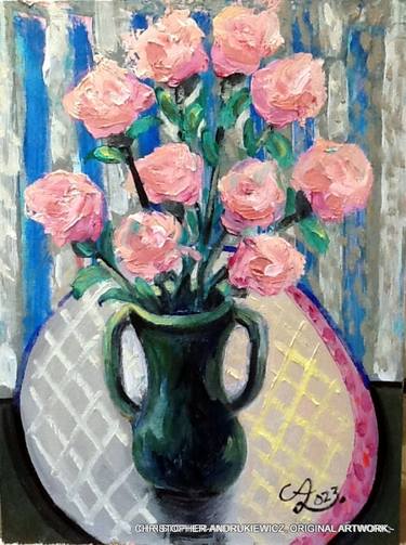 pink flowers in a vase. thumb