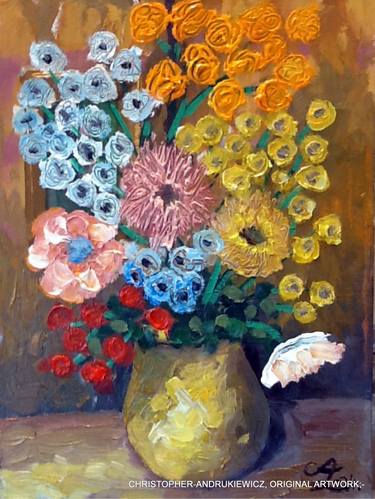 yellow vase with mixed flowers. thumb