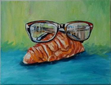 Croissant with glasses . thumb