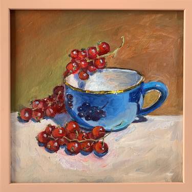Still life. Tea Cup and red currants. thumb