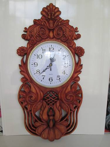 woodcarved wall clock thumb