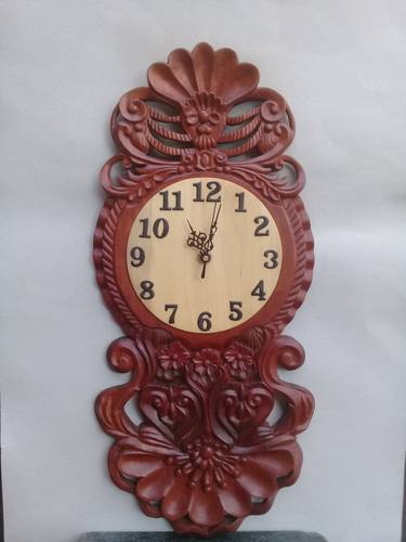 Woodcarved wall clock thumb