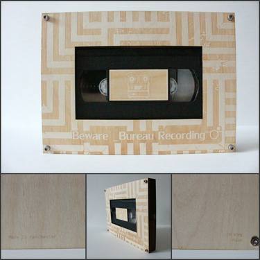 Engraved installation frame with 1 VHS tape. thumb