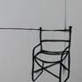 In the art work, I depicted a chair from my art studio. By this I mean that sometimes I am lonely