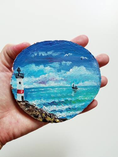 Oil painting on a slice of wood, Lighthouse and a sea thumb