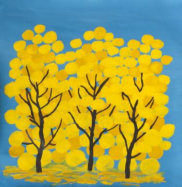 Yellow trees on blue sky thumb