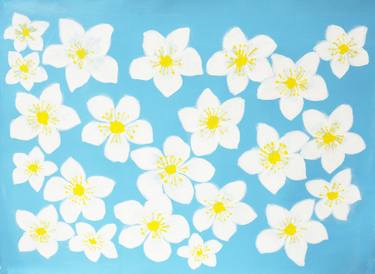 White flowers on blue thumb