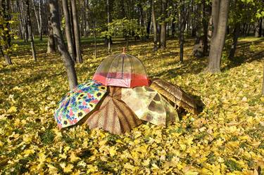 Autumn landscape with umbrellas thumb