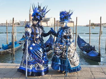 Couple in blue carnival costumes and mask on venice carnival. thumb
