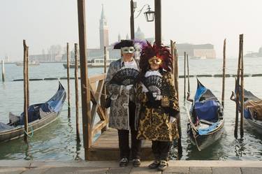 Couple in carnival costumes and masks on Venice carnival thumb
