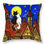 Two cats black and white on roof of old European town with tiled roofs with moon and stars.