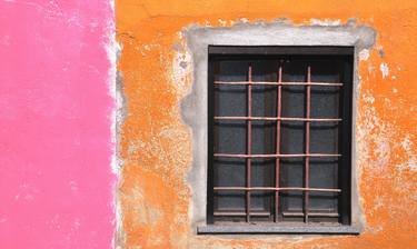 old windows on coloured wall thumb