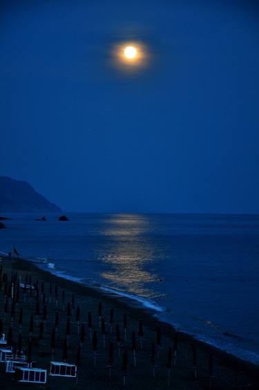 the moon above the sea in summer thumb
